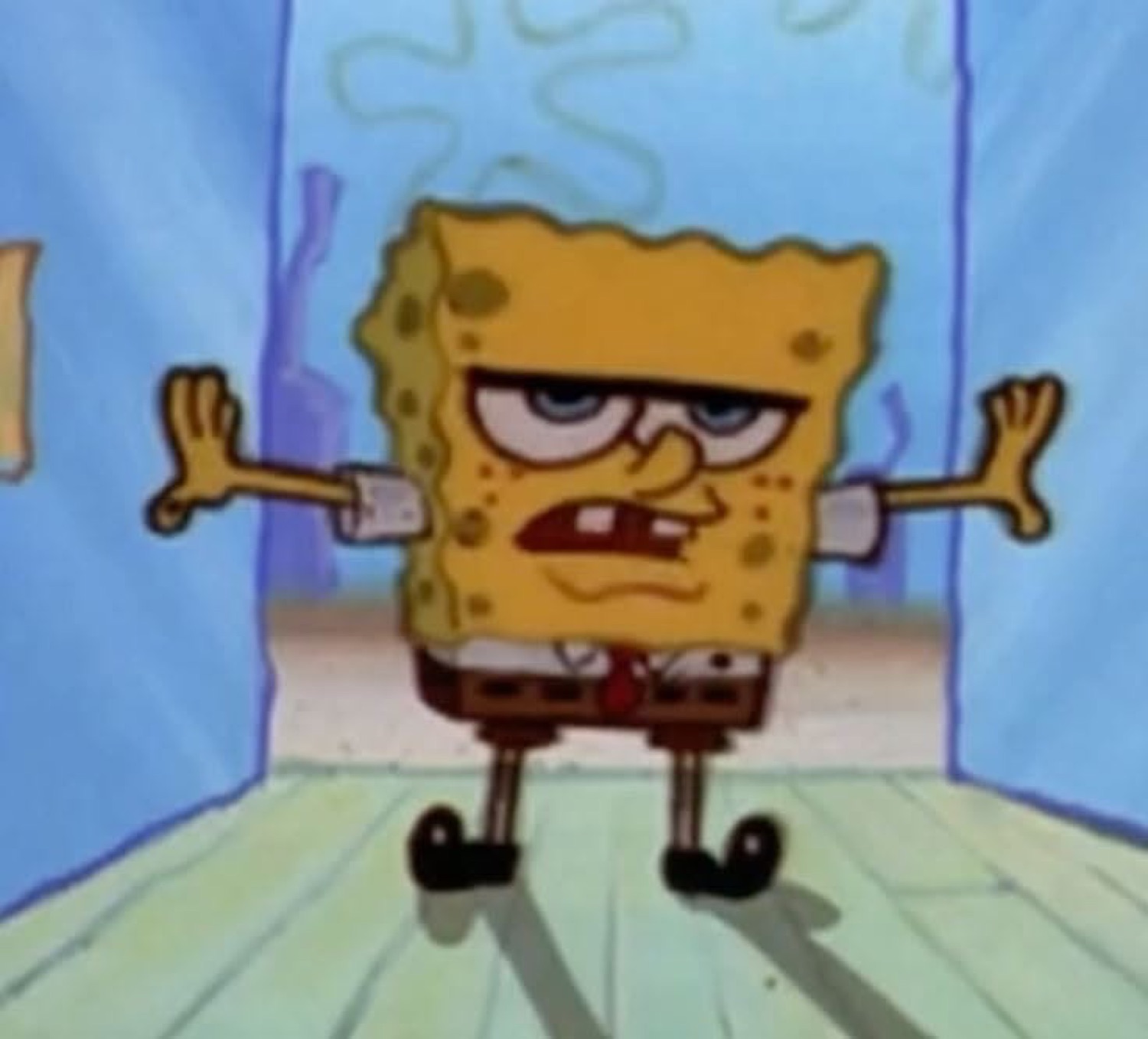 SpongeBob standing with arms out and a tired, unimpressed grimace
