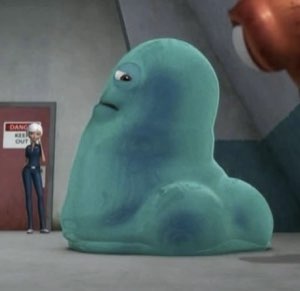 B.O.B. the teal blob from Monsters vs. Aliens staring with utter indifference