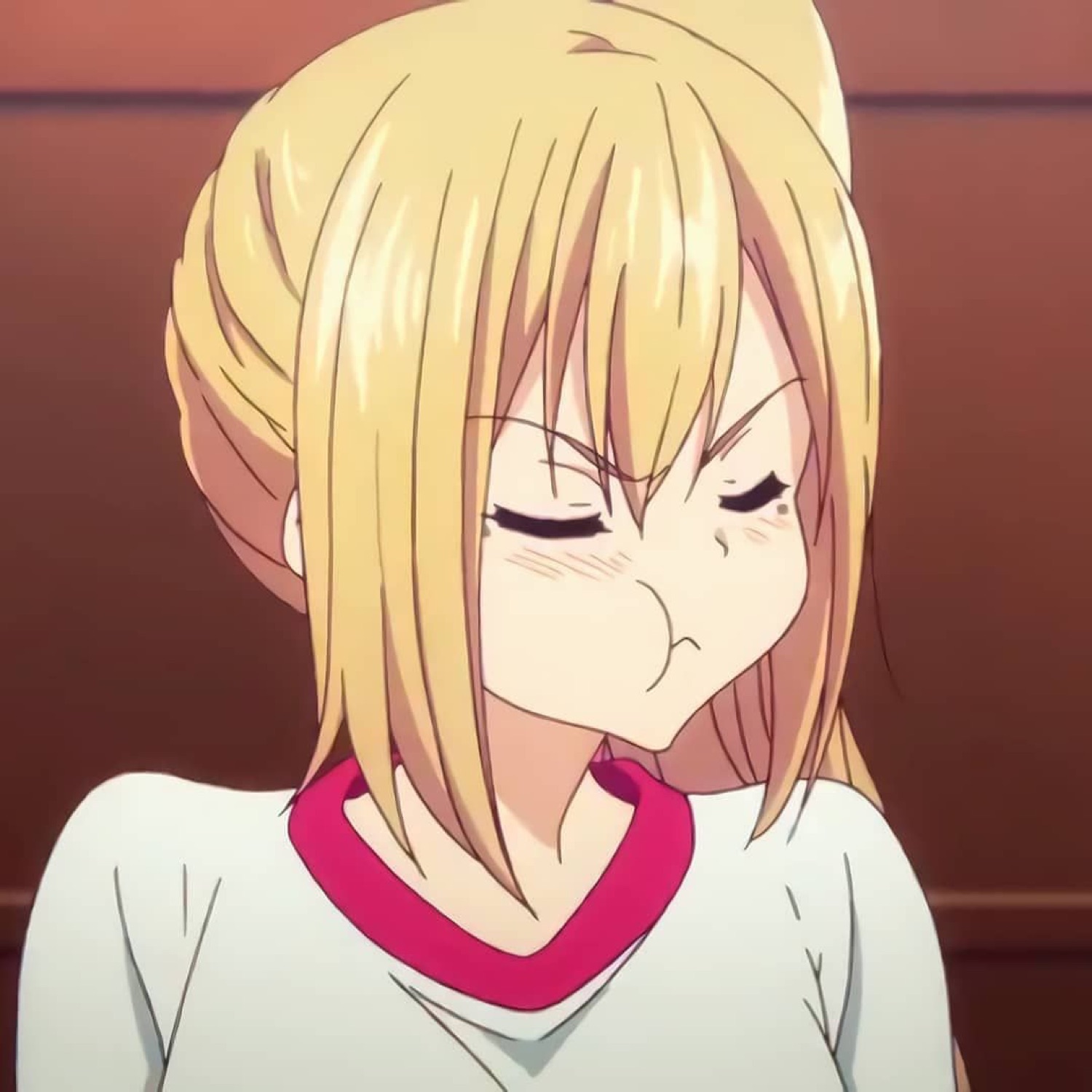 Blonde anime girl with her eyes shut and mouth scrunched in quiet irritation
