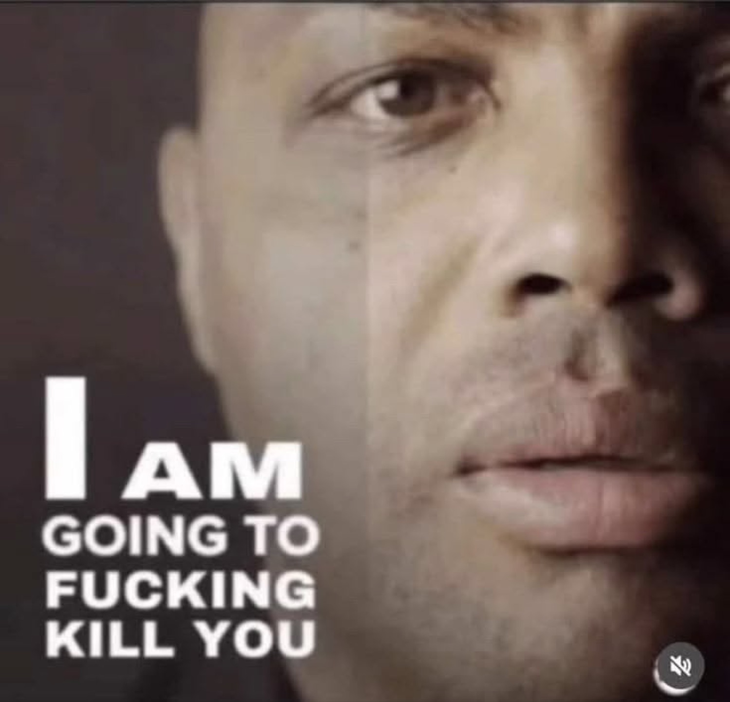 Extreme close-up of a stone-cold face captioned 'I AM GOING TO FUCKING KILL YOU'