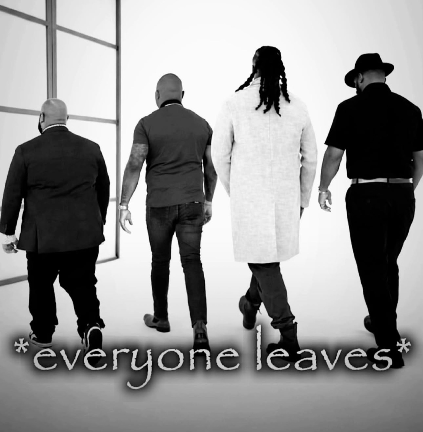Four men walking away in black and white, captioned '*everyone leaves*'
