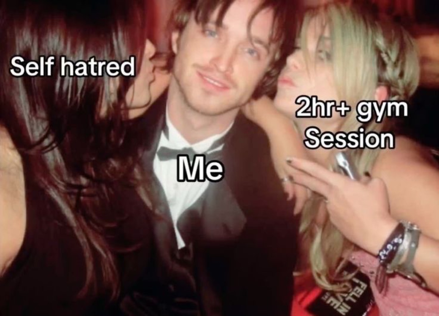 Jesse Pinkman smiling between two women: 'Self hatred / Me / 2hr+ gym Session'