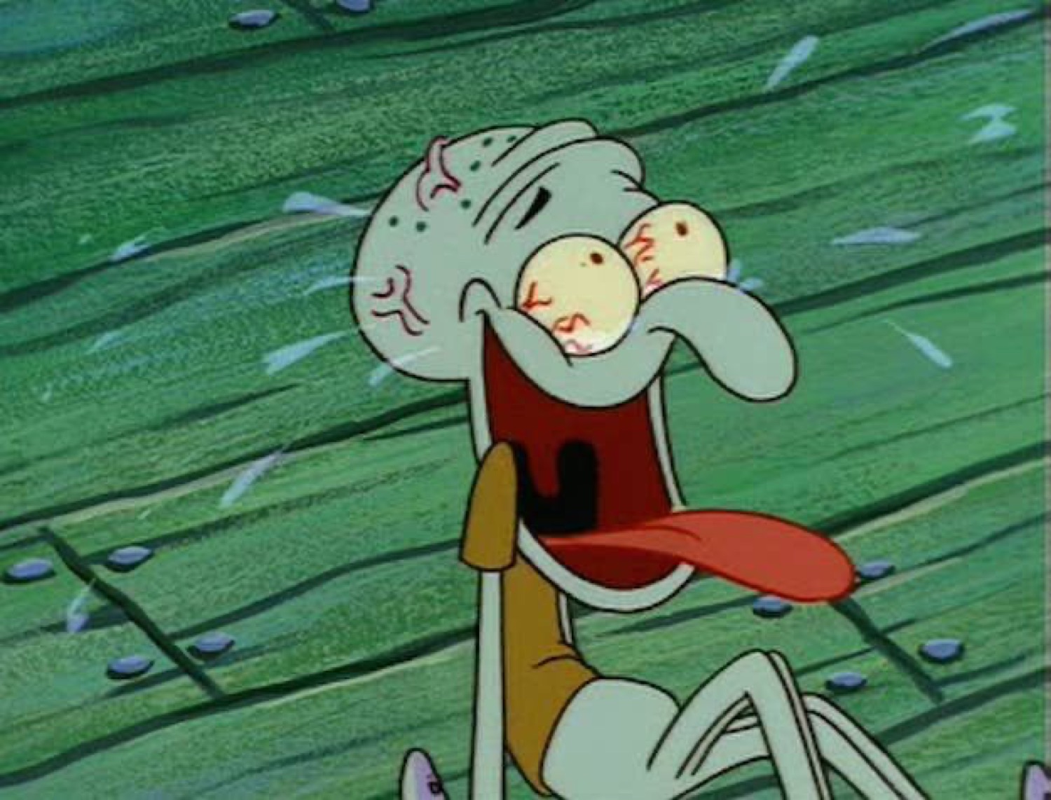 Squidward sobbing with bloodshot eyes and an open mouth mid-breakdown