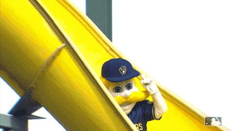 Bernie Brewer mascot riding down his yellow slide