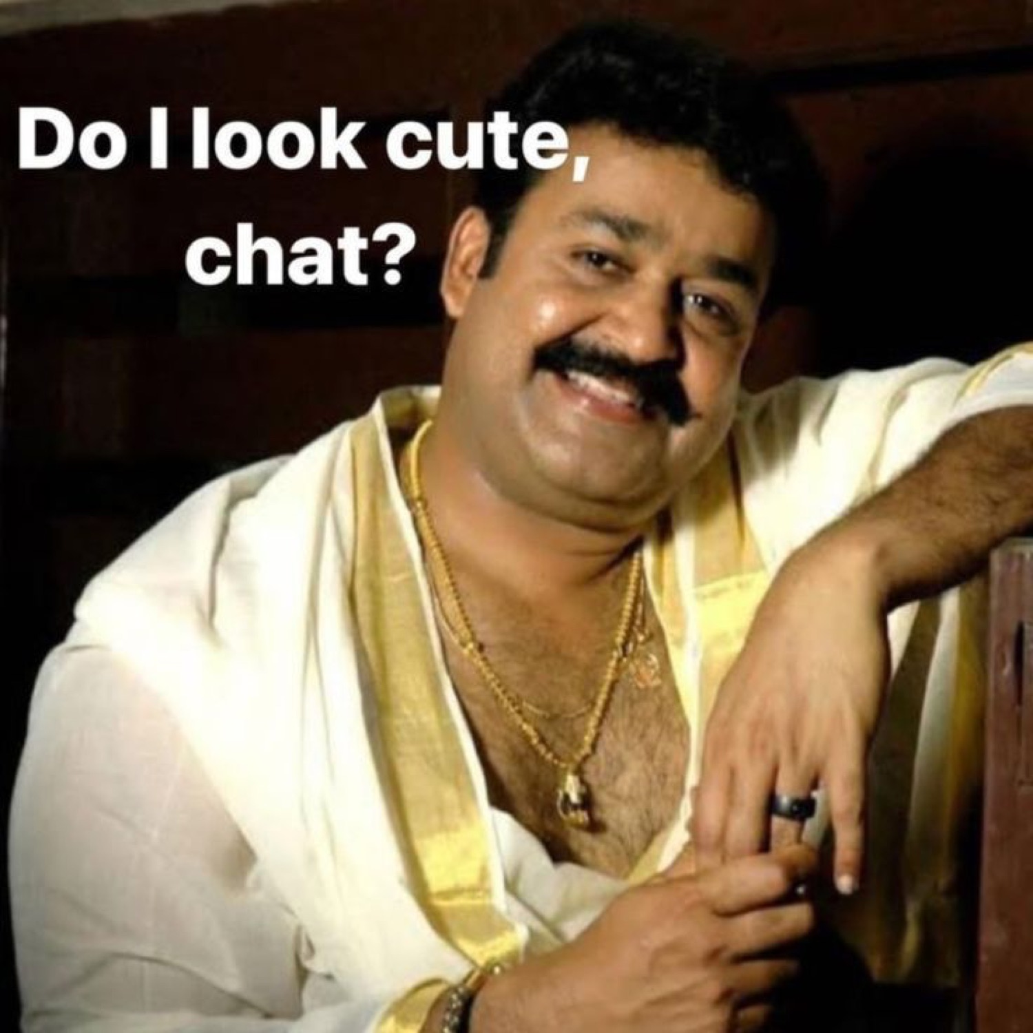 Mohanlal grinning: 'Do I look cute, chat?'