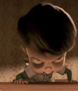Animated kid with a bowl cut glaring furiously over the edge of a table