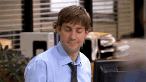 Jim Halpert from The Office raising his hand for a high five