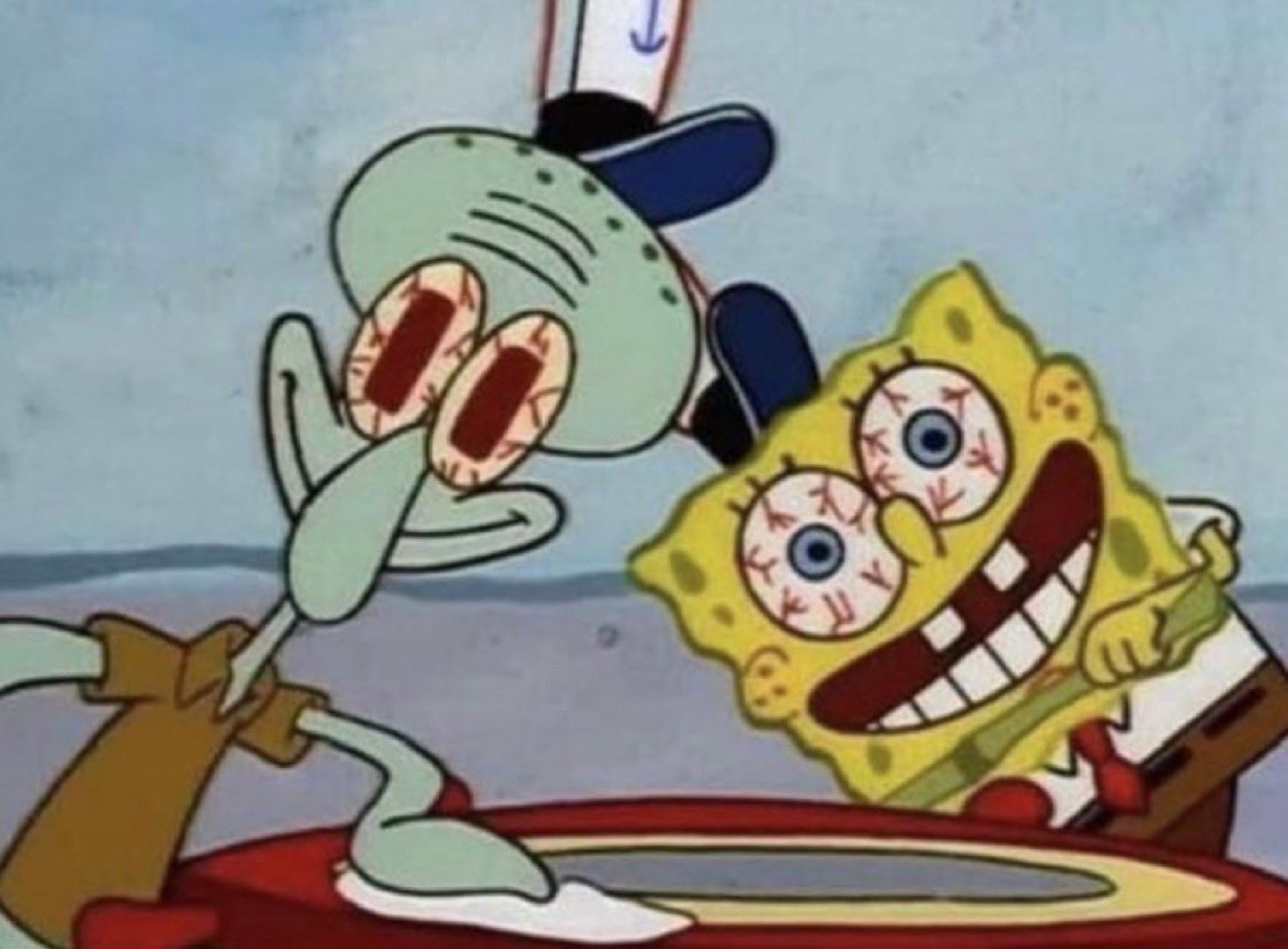Squidward and SpongeBob with bloodshot bulging eyes
