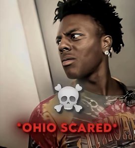 Young man glancing warily off-camera captioned '*Ohio scared*' with a skull emoji