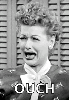Lucille Ball wailing in black and white, "Ouch"