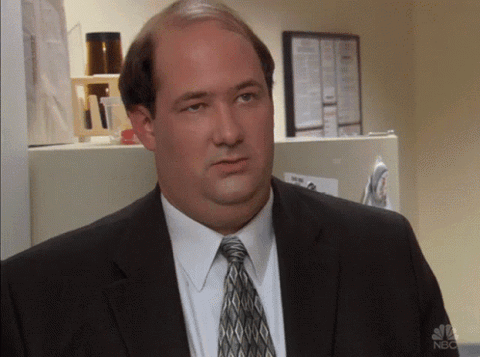 Kevin Malone from The Office giving two thumbs down