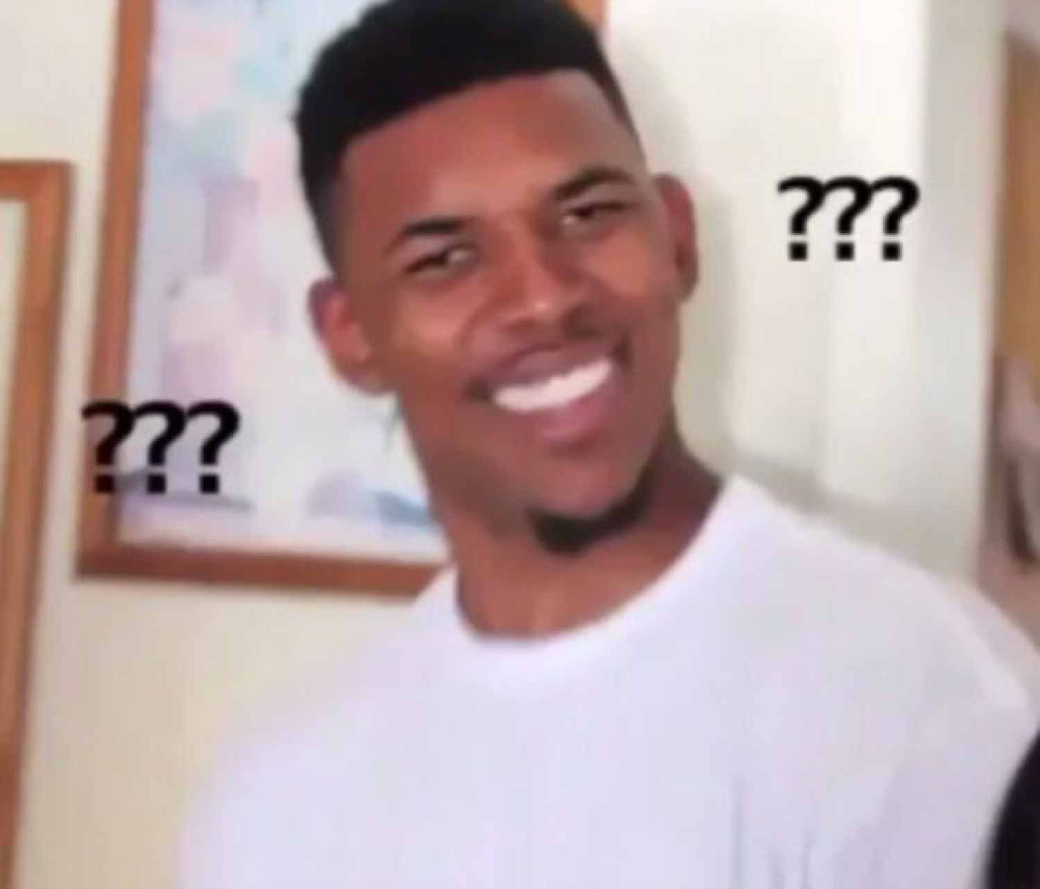 Nick Young smiling with floating question marks around his head, totally puzzled