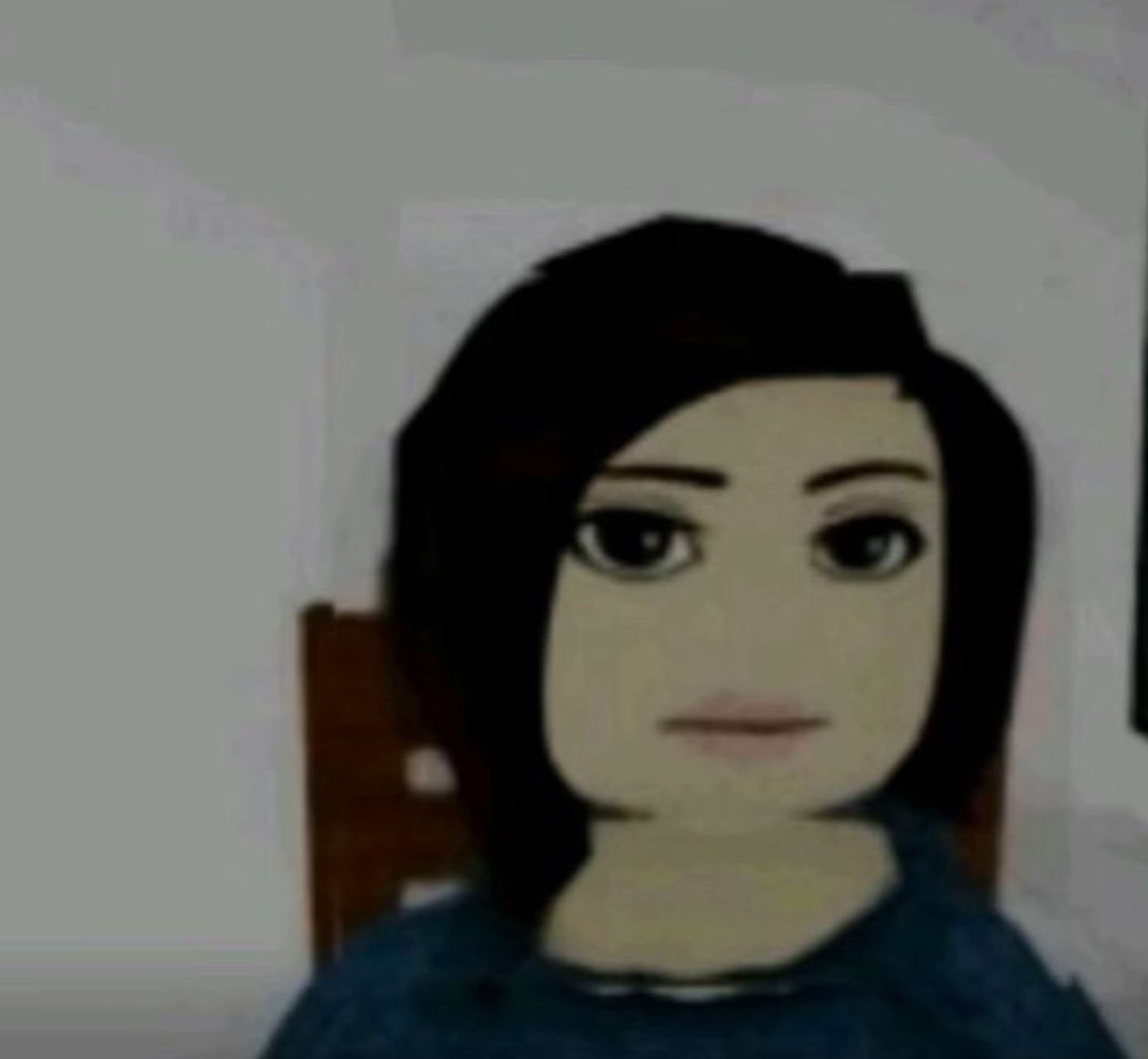 Blocky Roblox-style avatar with a low-res human face staring blankly