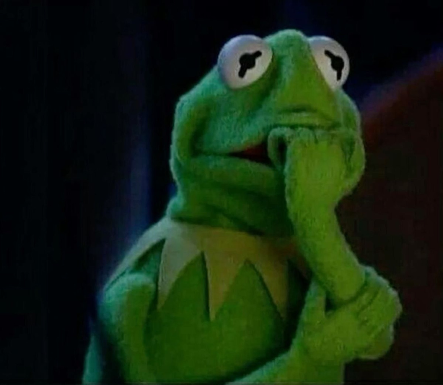 Kermit the Frog with a hand to his mouth, deep in nervous thought