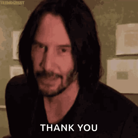 Keanu Reeves putting his hand on his heart, "Thank you"