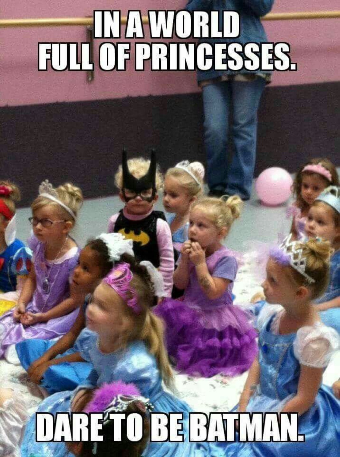 Kid in a Batman mask among princesses: 'IN A WORLD FULL OF PRINCESSES. DARE TO BE BATMAN.'