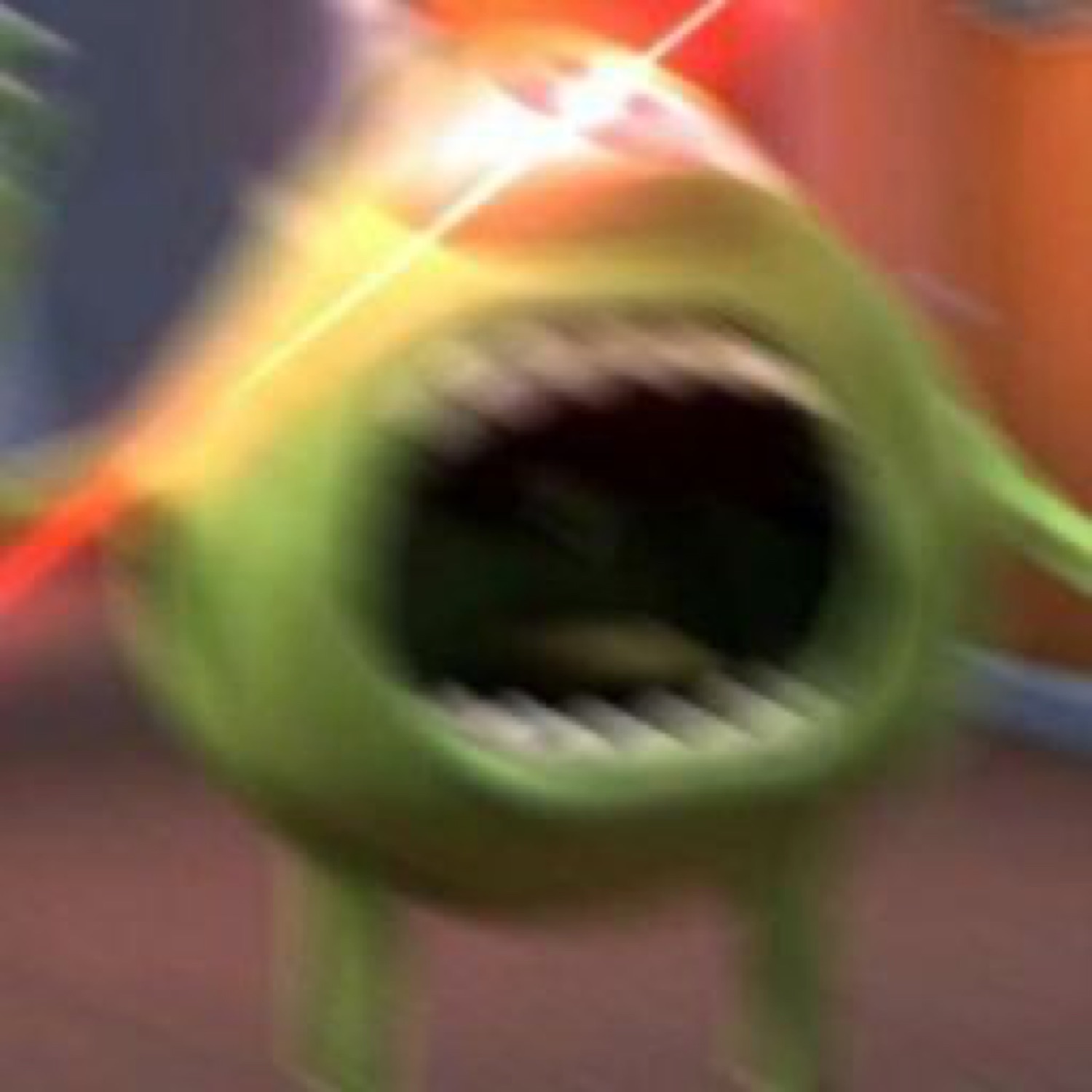 Mike Wazowski from Monsters Inc. launching toward the camera mouth wide open in full panic