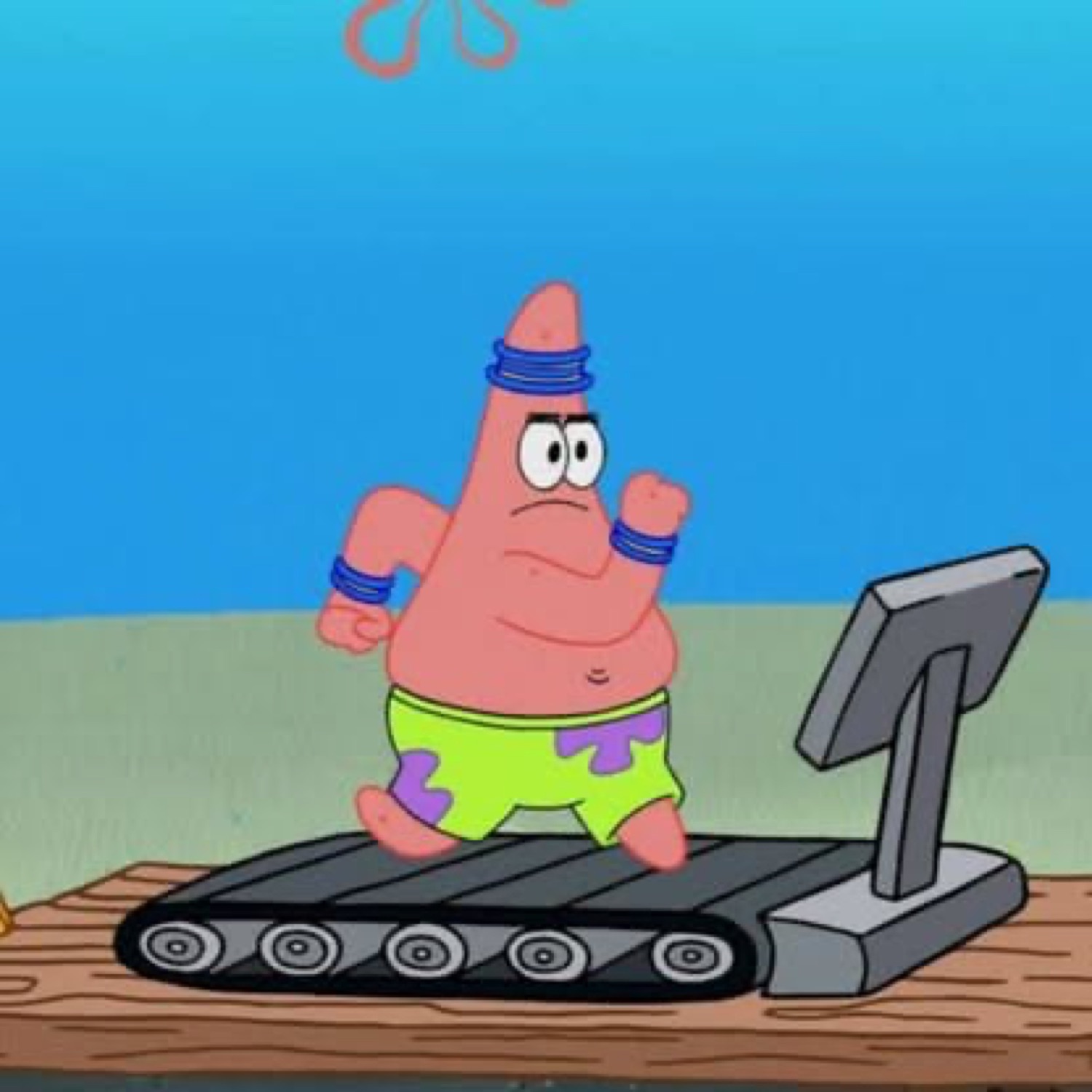 Patrick Star running on a treadmill with a determined face