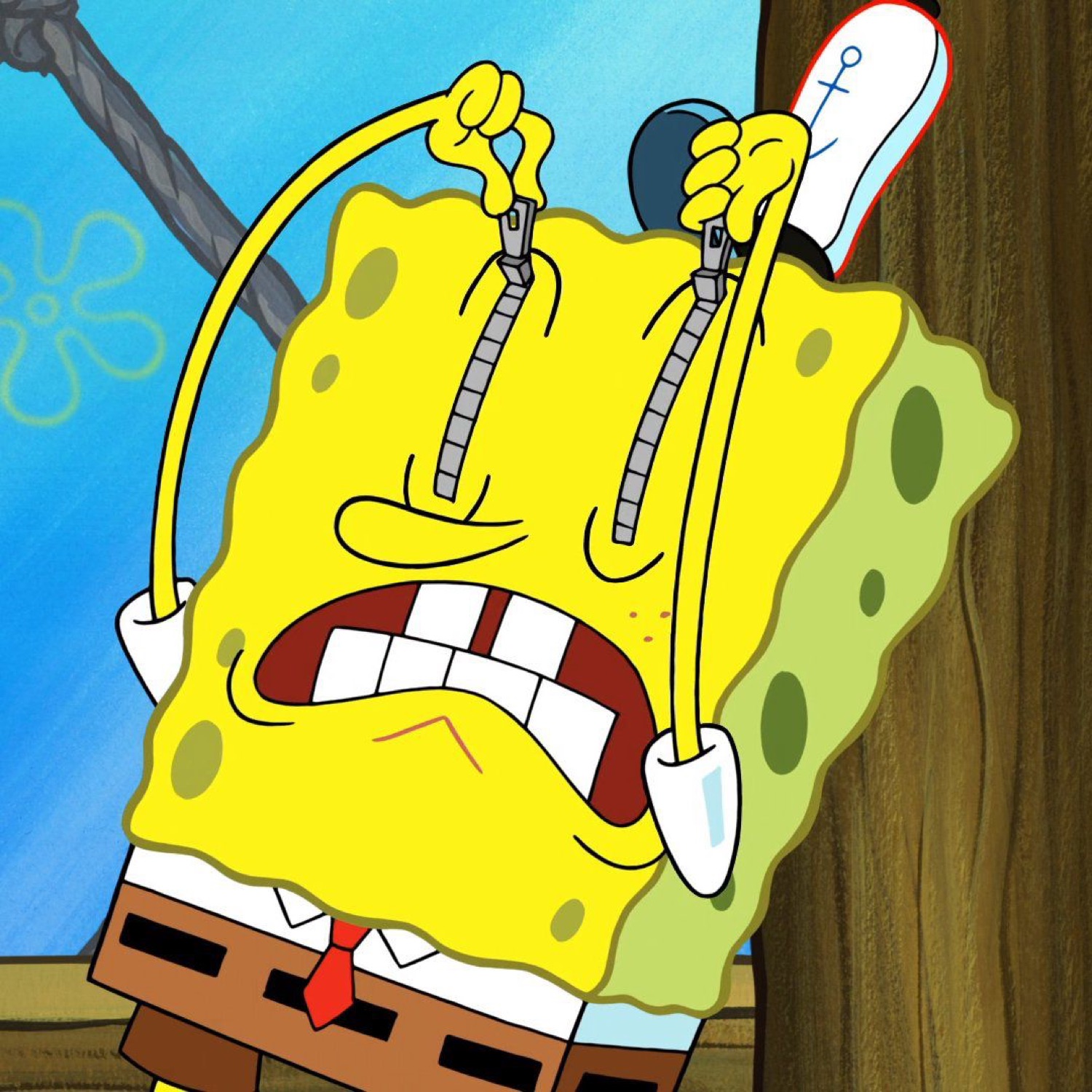 SpongeBob unzipping his own face in anguish, eyes and teeth everywhere