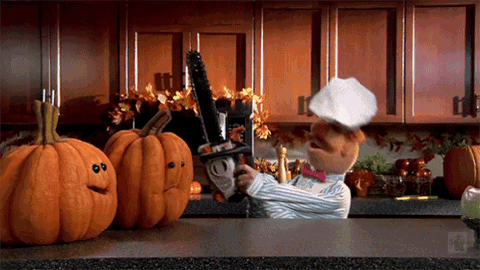 Swedish Chef carving pumpkins with a chainsaw