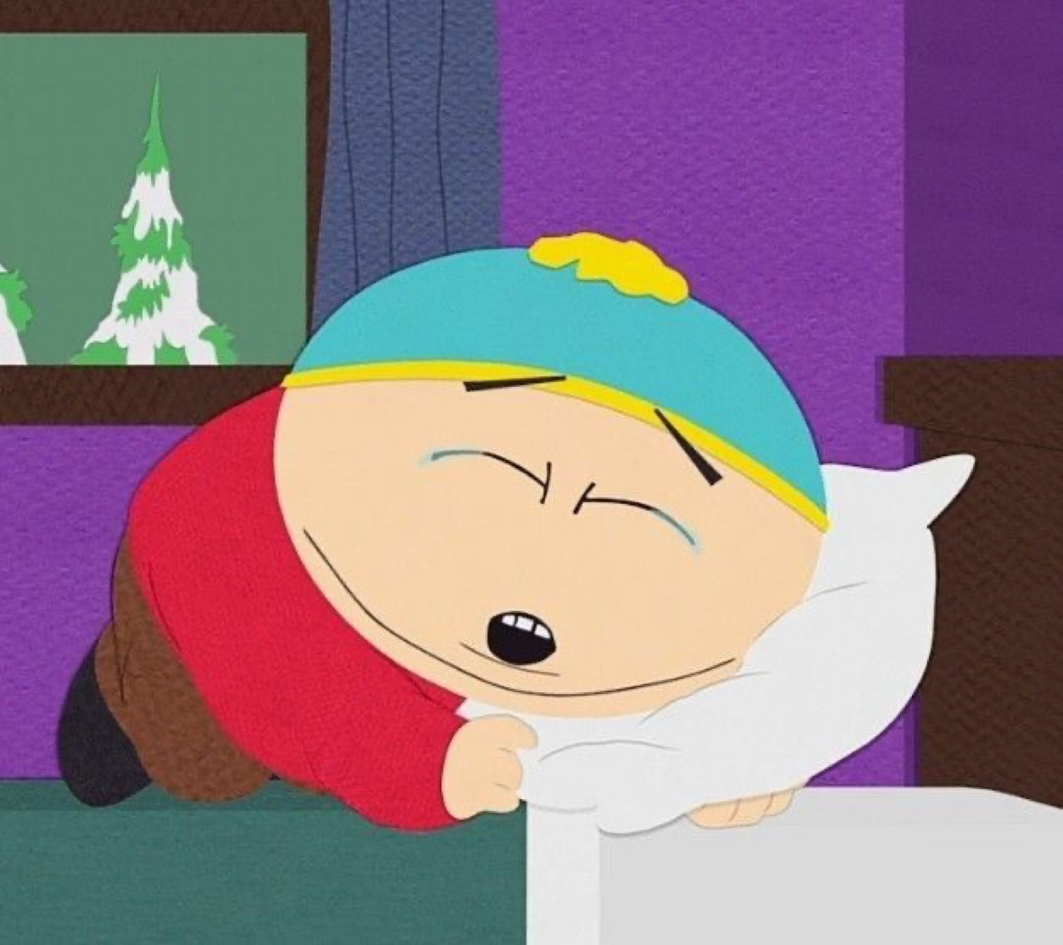 Cartman from South Park crying face-down into a pillow