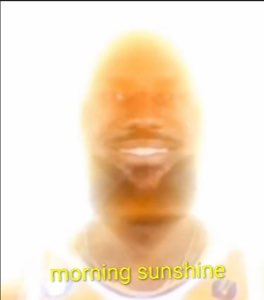 Glowing blurred grinning face: 'morning sunshine'