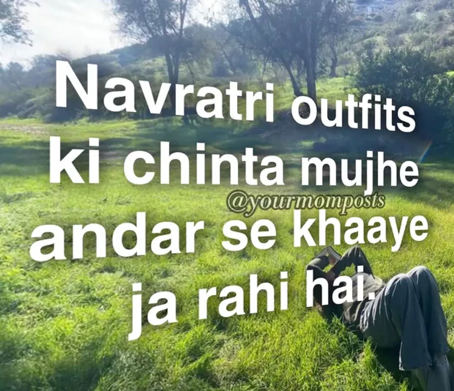 Person lying in grass: 'Navratri outfits ki chinta mujhe andar se khaaye ja rahi hai' (worrying about Navratri outfits is eating me alive)