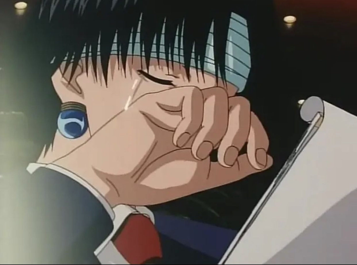 Anime character silently crying while covering their face with a paper