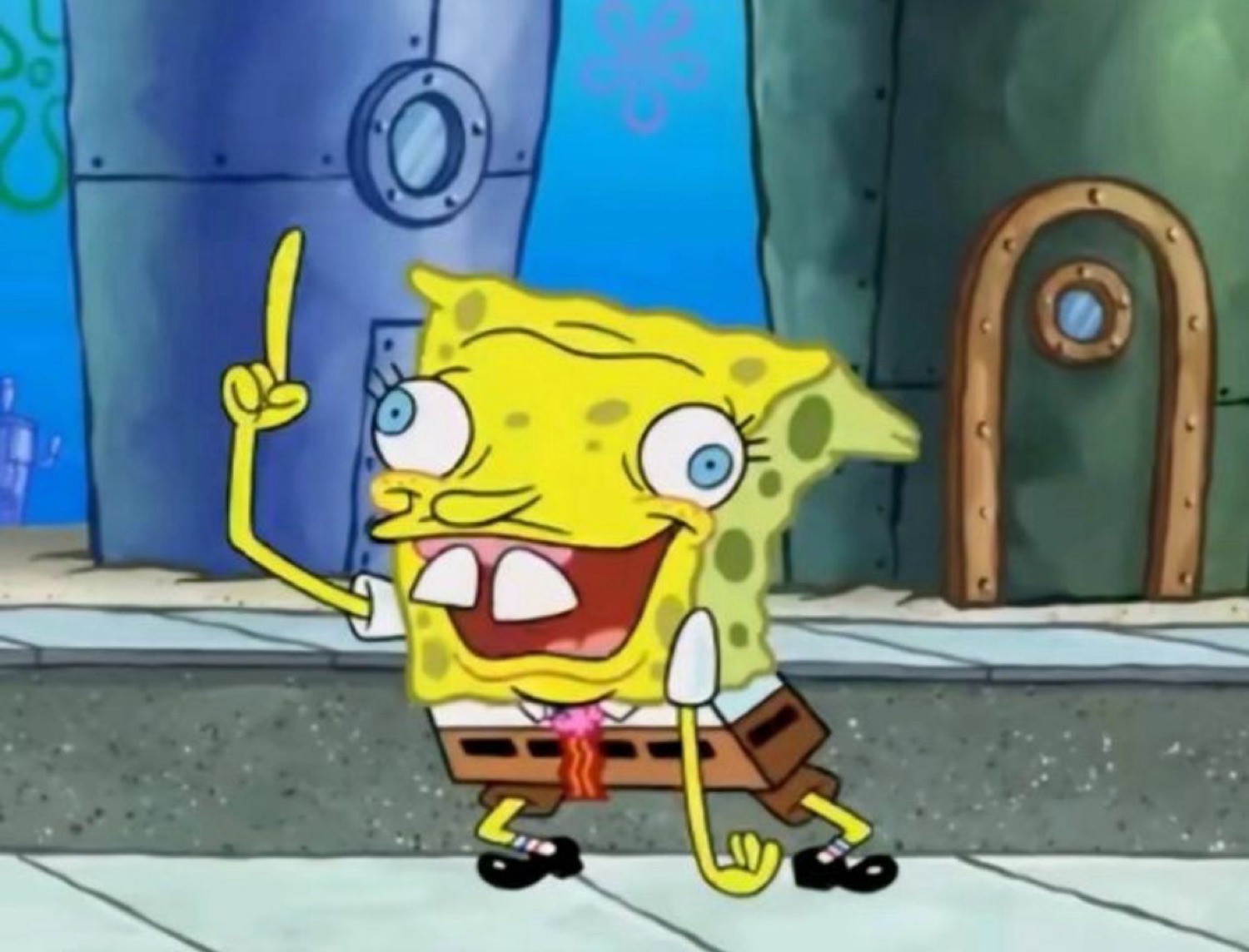 SpongeBob with a goofy distorted face pointing a finger up mid-dance