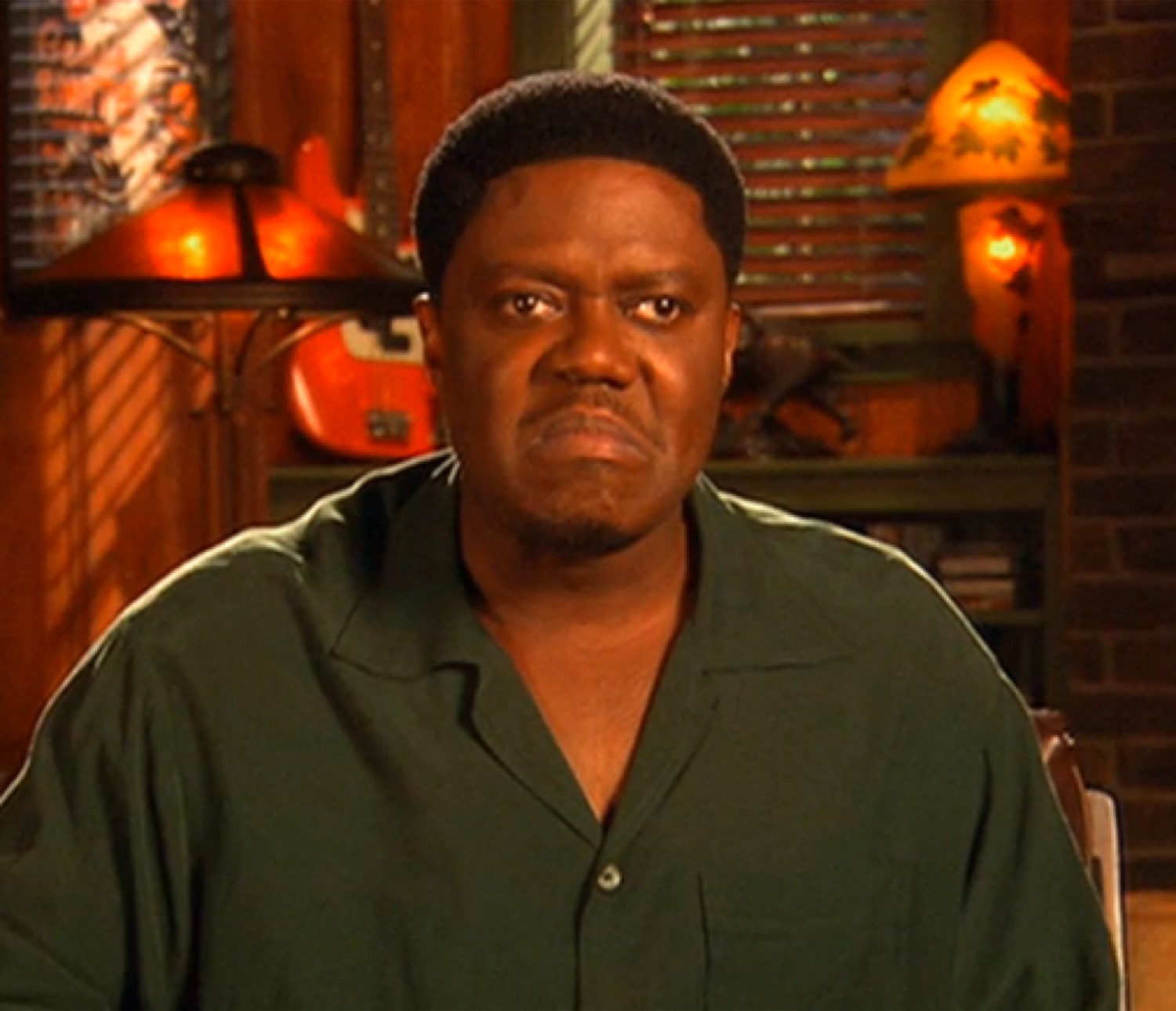 Bernie Mac glaring with a disgusted scowl