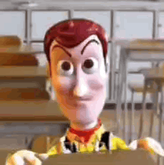Woody from Toy Story with a strained, twitching fake smile in a classroom
