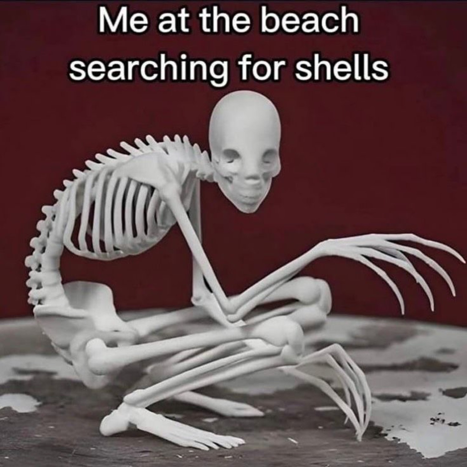 Hunched crab-legged skeleton captioned 'Me at the beach searching for shells'