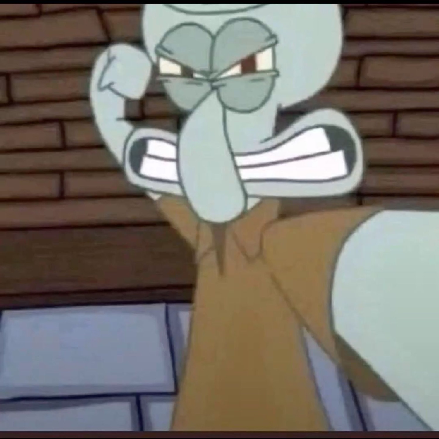 Angry Squidward leaning into the camera mid-yell with clenched fist