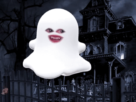 Cartoon ghost with red lips floating in front of a haunted mansion