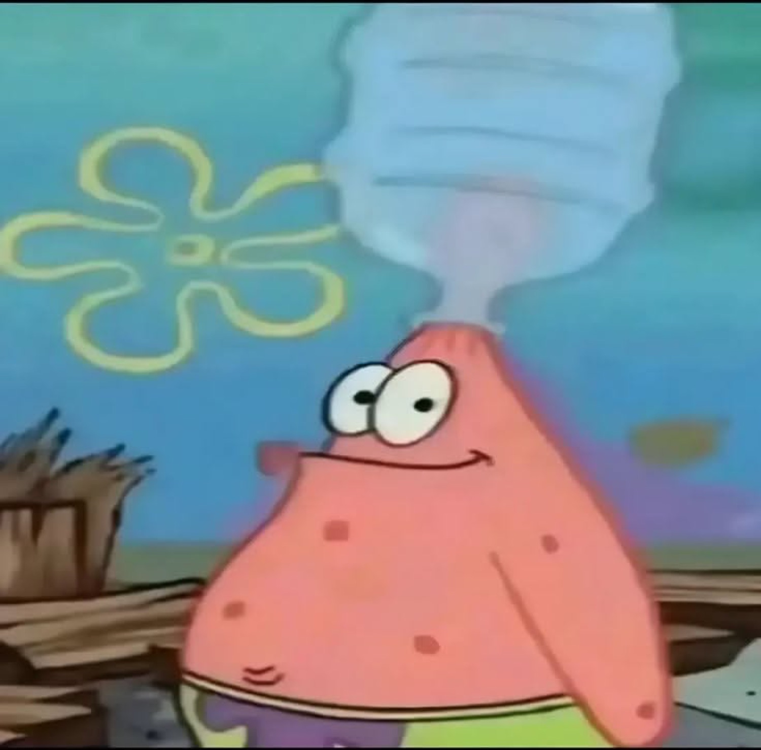 Patrick Star with a blank, glazed-over stare and steam rising off his head