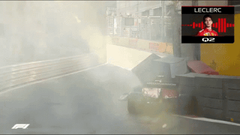 Formula 1 car in a cloud of smoke with Leclerc's radio, "I am stupid"