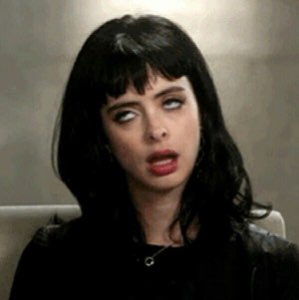 Dark-haired woman rolling her eyes all the way back in total exasperation
