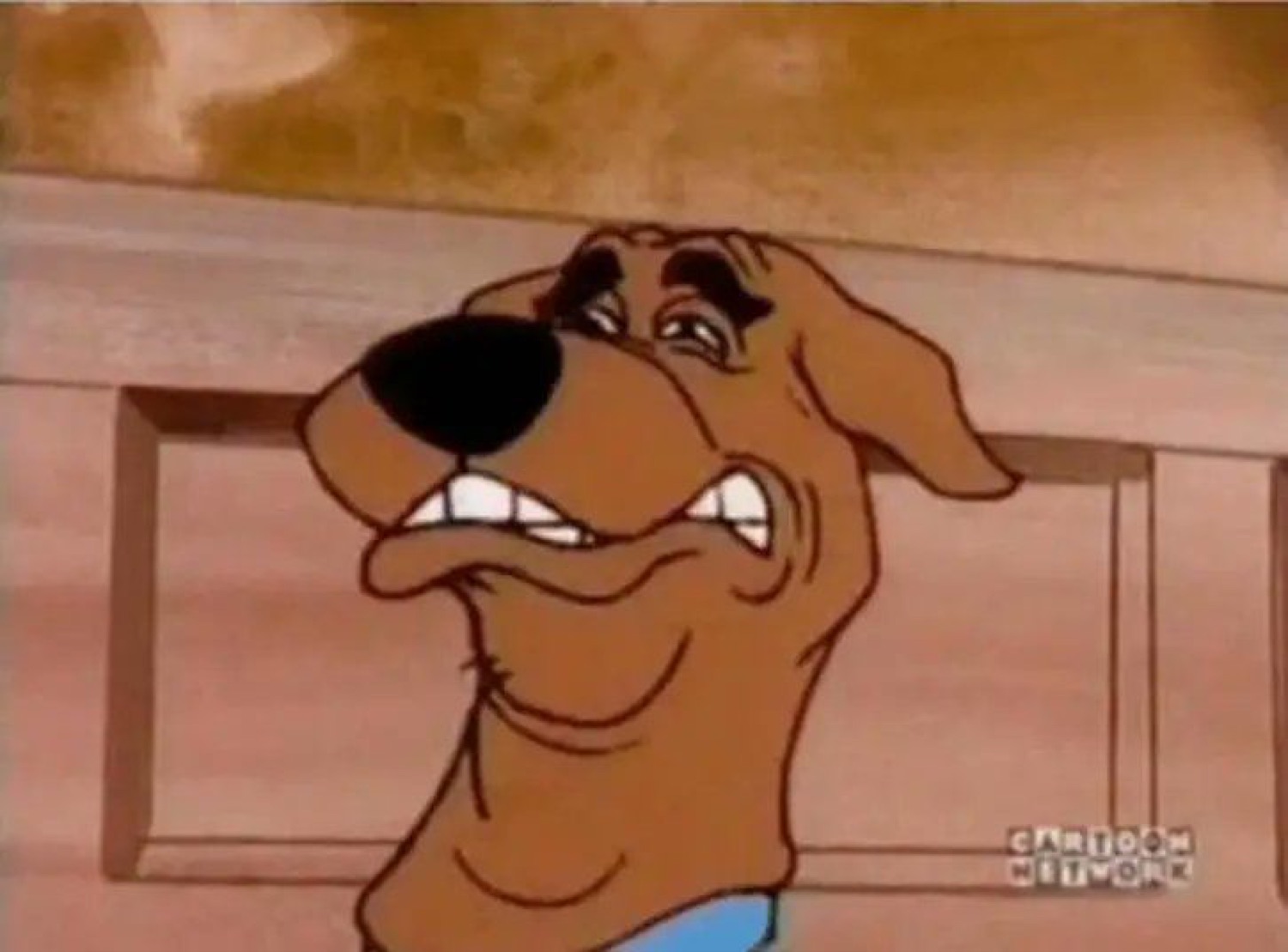Scooby-Doo baring his teeth in a disgusted grimace