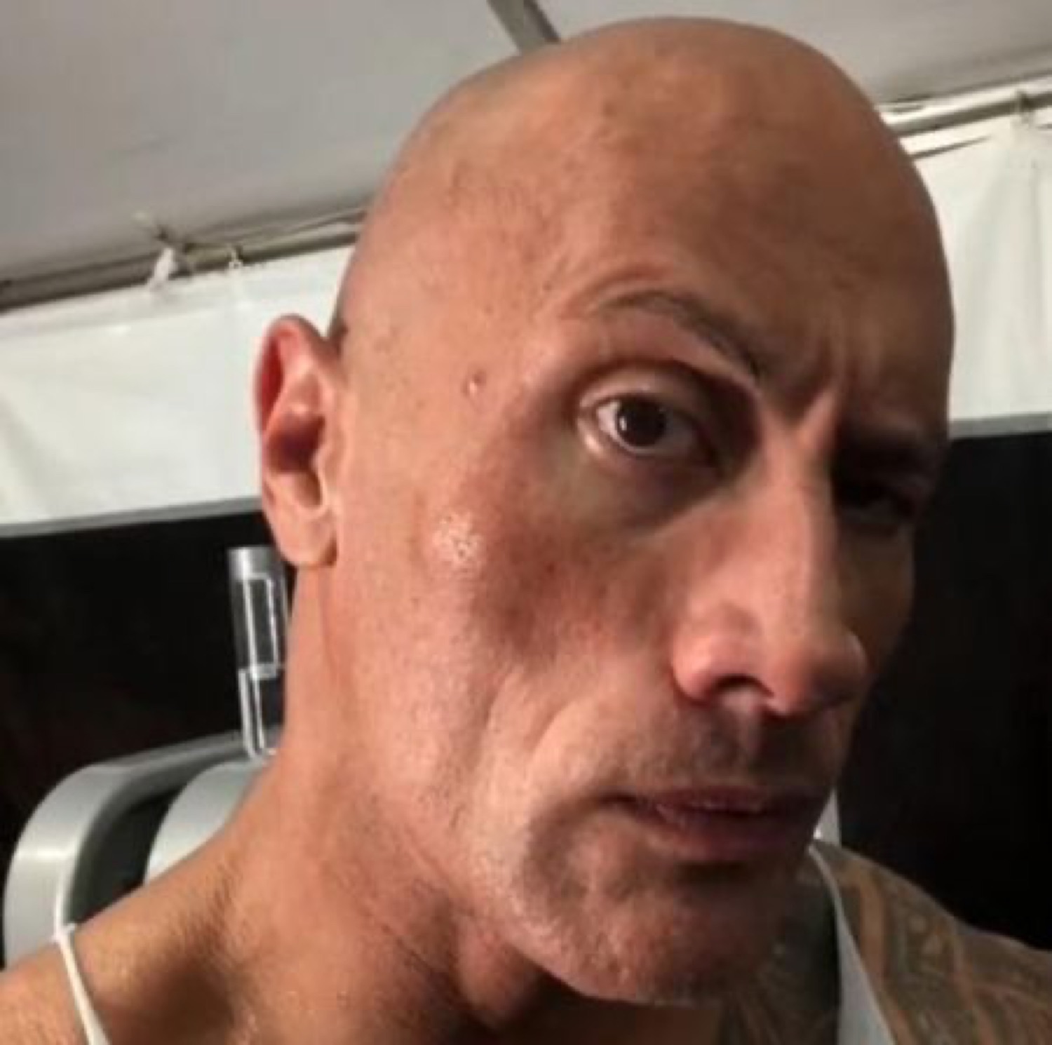 Dwayne 'The Rock' Johnson raising an eyebrow