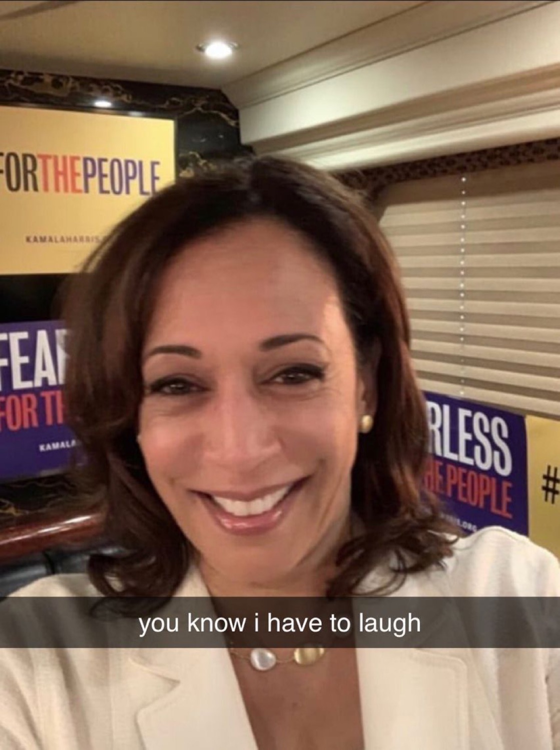 Kamala Harris grinning in a selfie with 'you know i have to laugh' captioned beneath