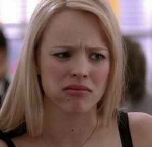 Regina George with furrowed brows and a quivering lip, visibly not impressed
