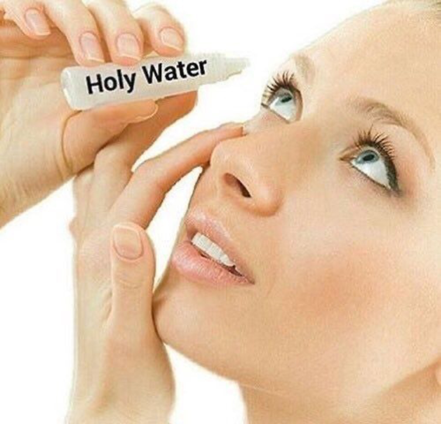 Woman putting eye drops labeled 'Holy Water' into her eye