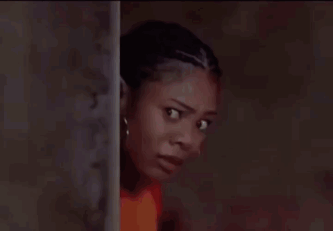 Woman jumping in fright then laughing