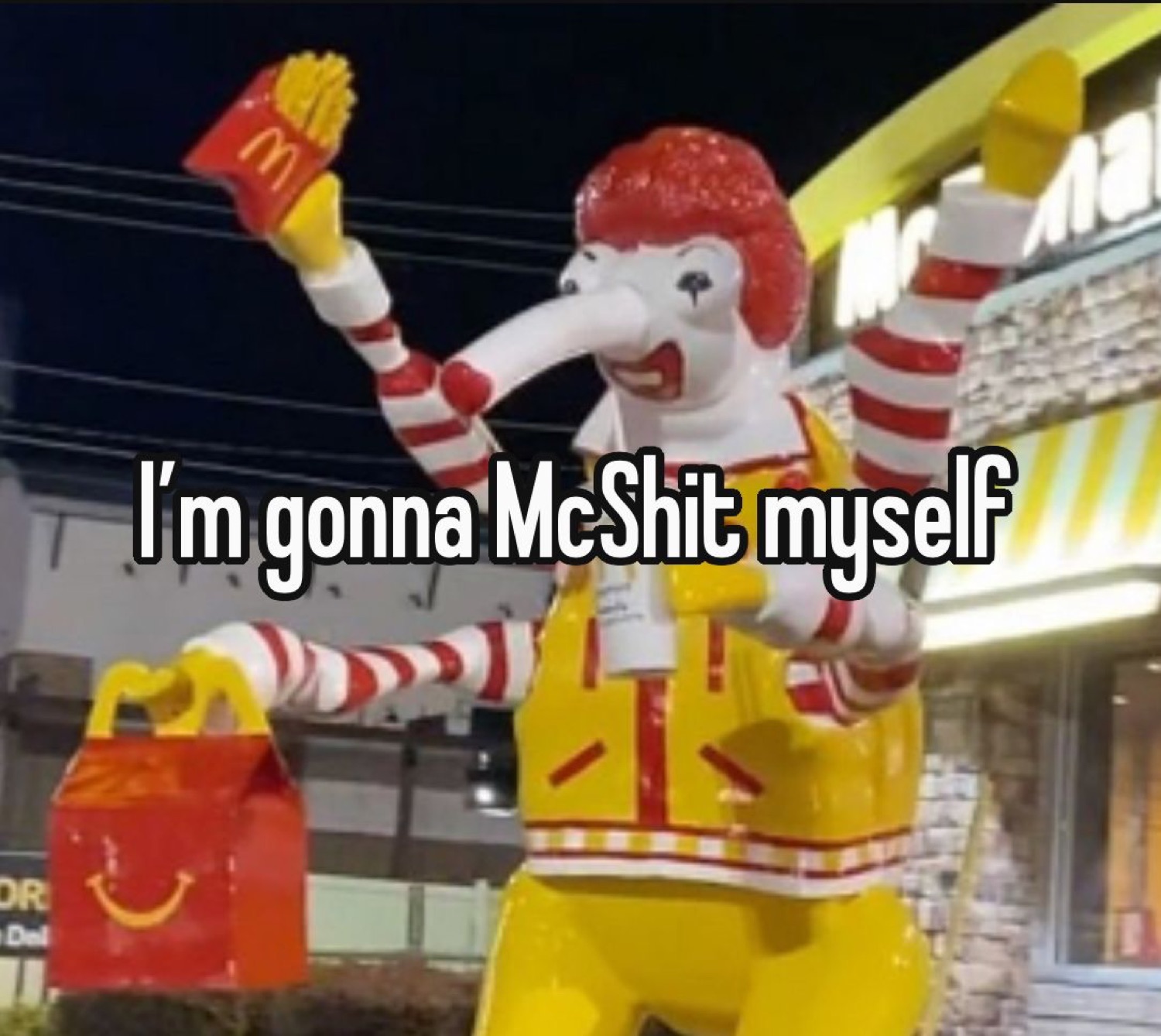 Ronald McDonald statue holding fries captioned 'I'm gonna McShit myself'