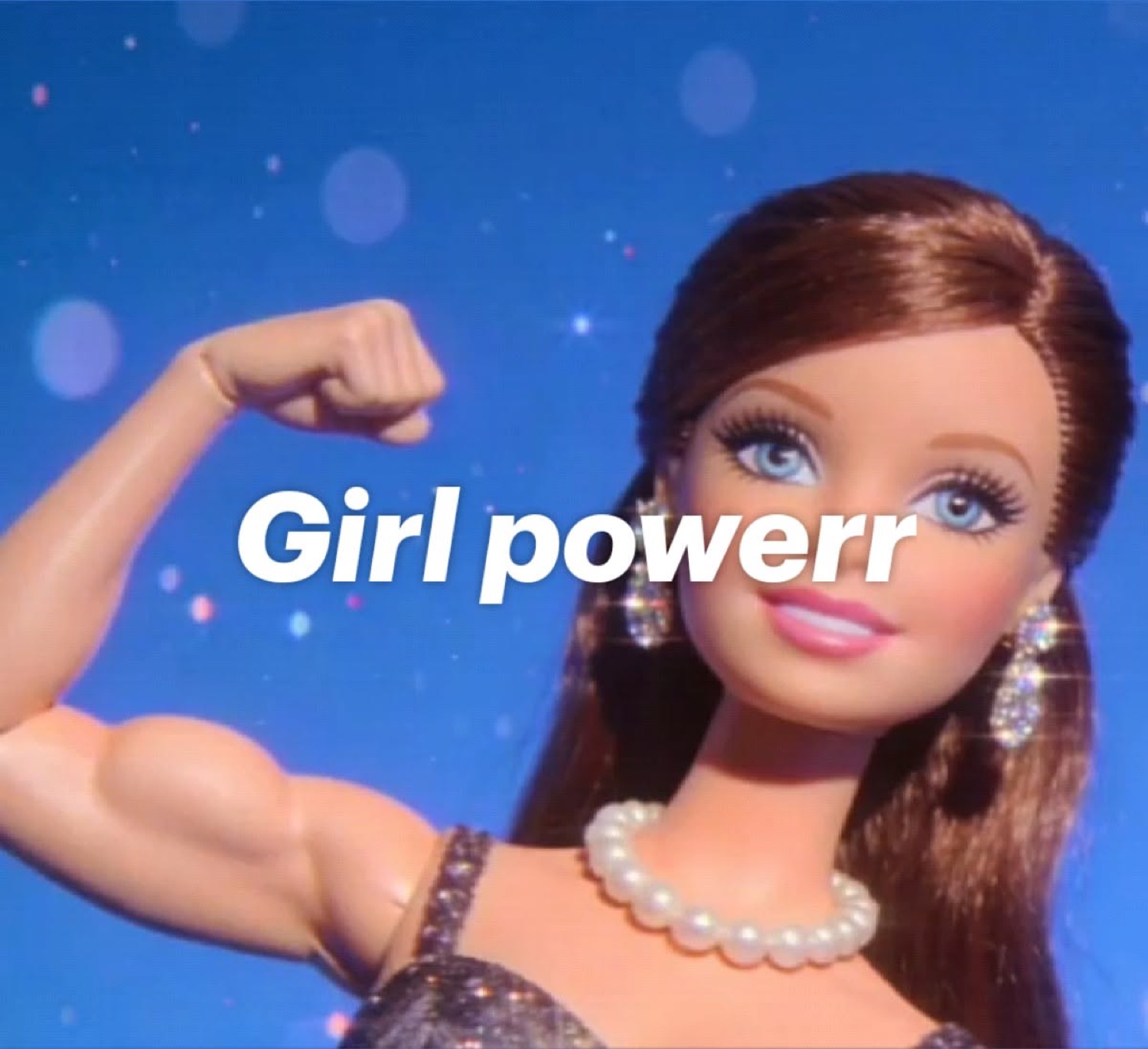Barbie with a flexed muscular arm: 'Girl powerr'