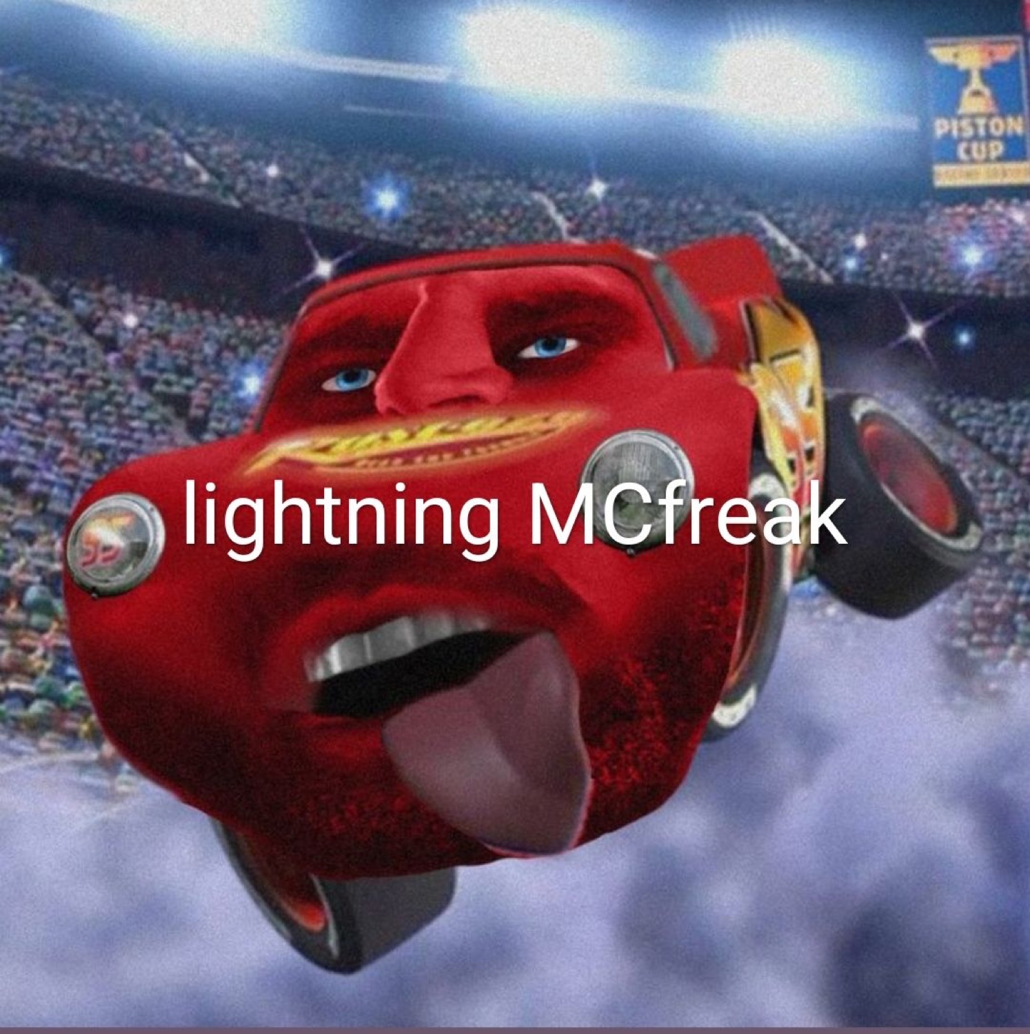 Lightning McQueen with a human face photoshopped on, tongue out, labeled 'lightning MCfreak'