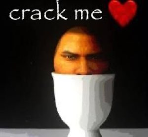 Man's scowling face inside a white egg cup captioned 'crack me' with a red heart