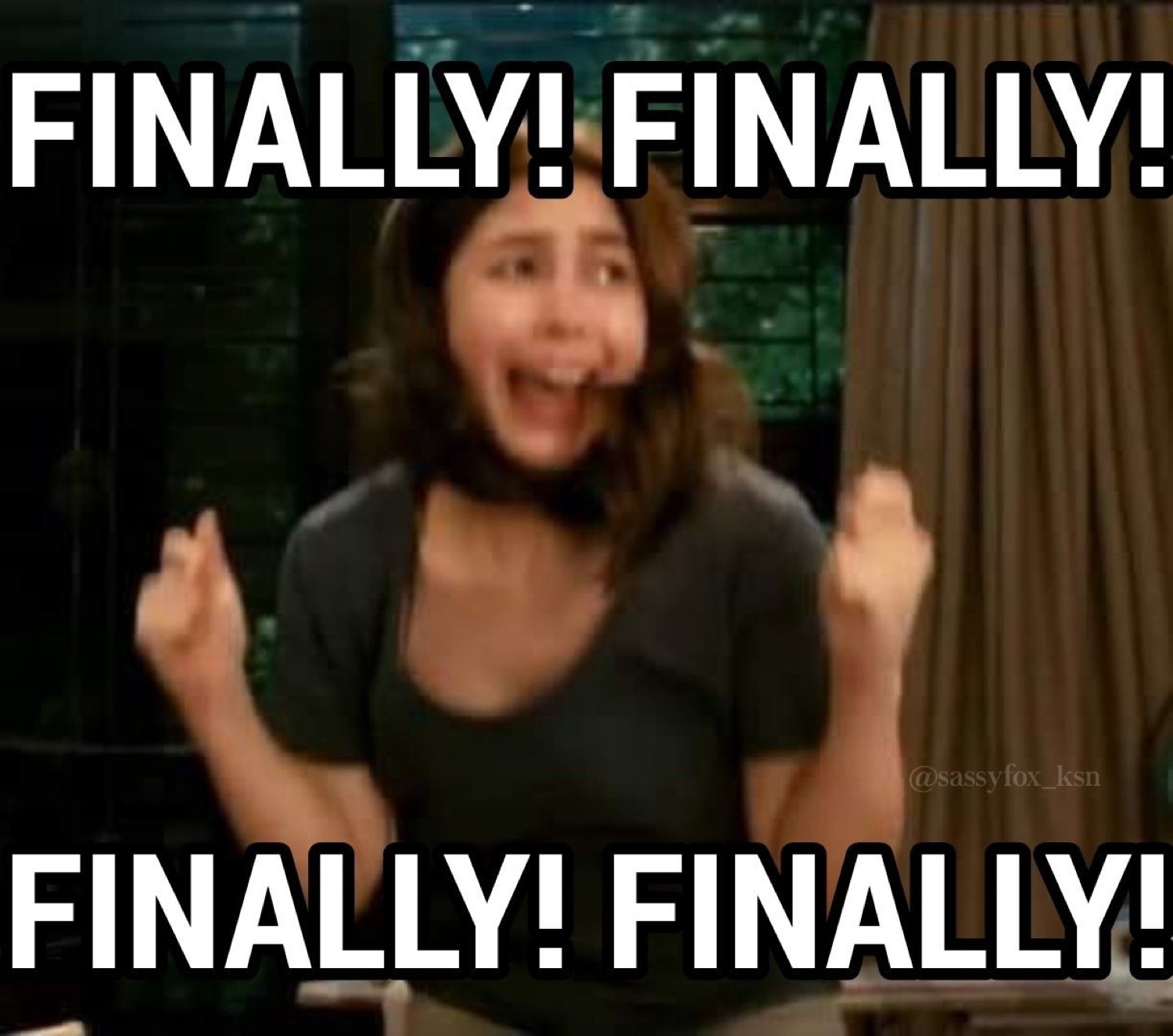Woman cheering with fists up: 'FINALLY! FINALLY! FINALLY! FINALLY!'