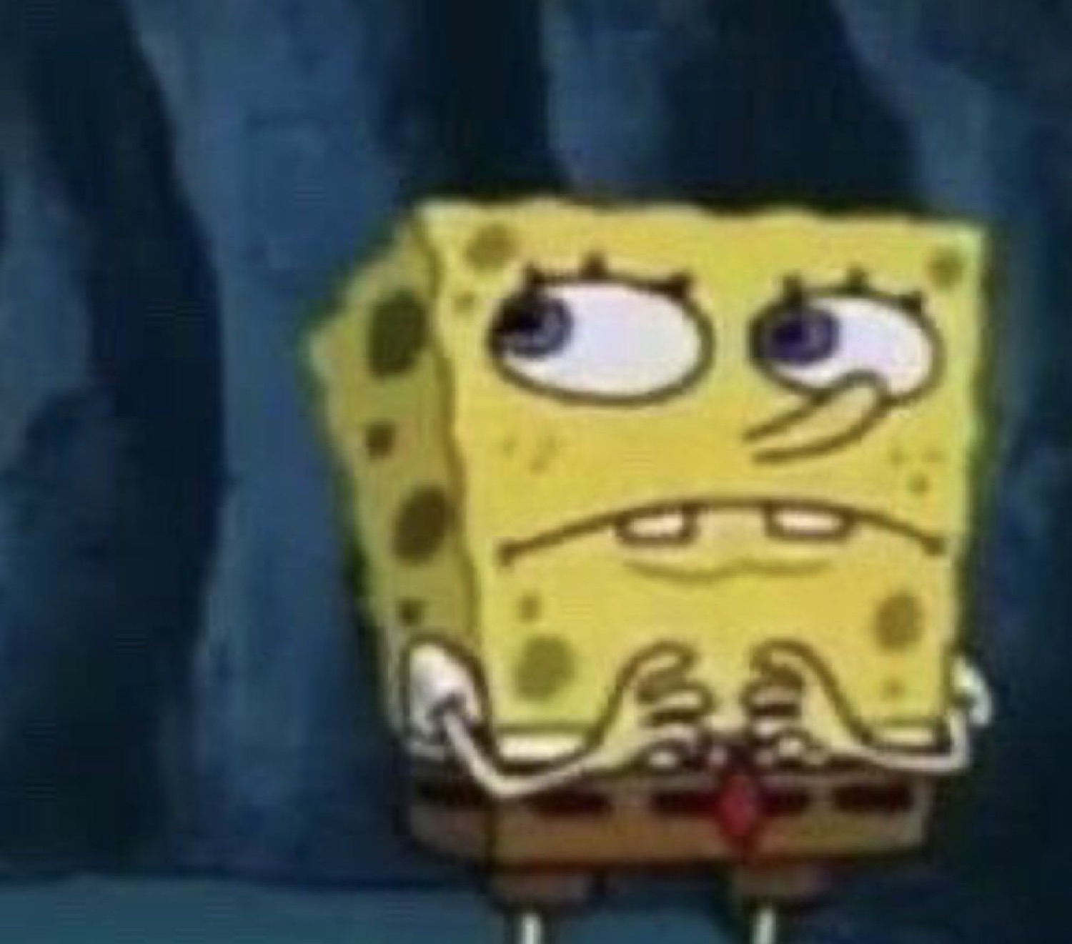 SpongeBob giving a strained, irritated side-grimace with half-lidded eyes