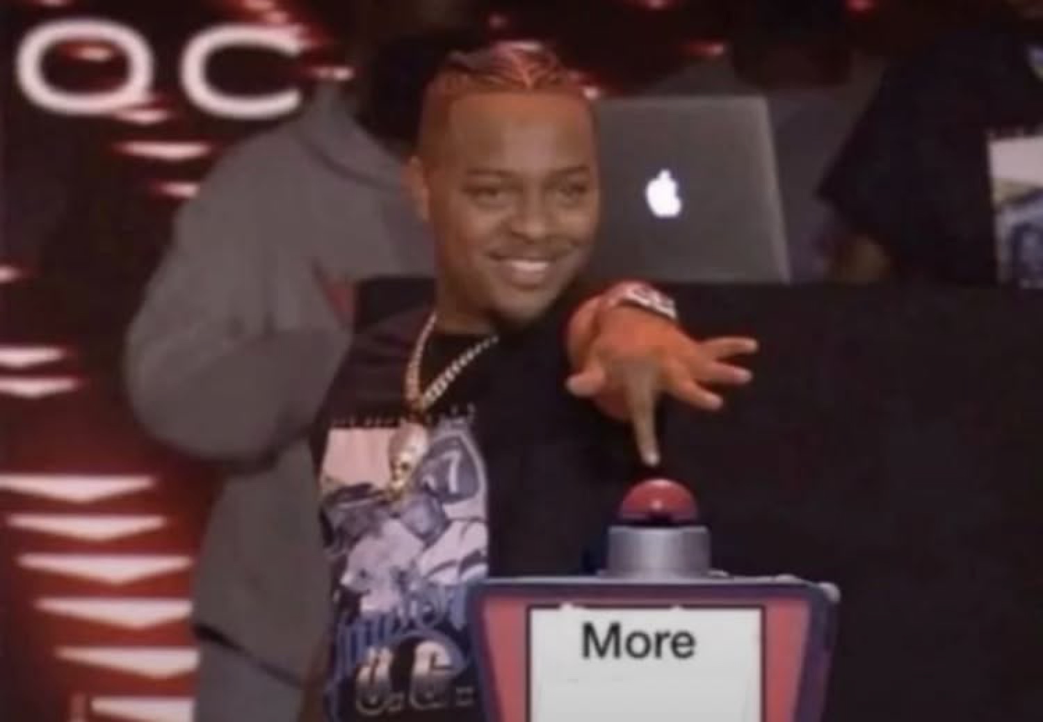 Bow Wow smirking and slamming a 'More' button
